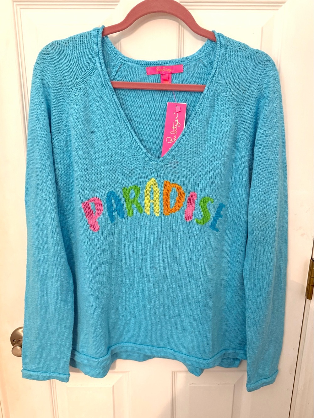 Lilly Pulitzer turquoise knit sweater with multicolored “Paradise” pattern
